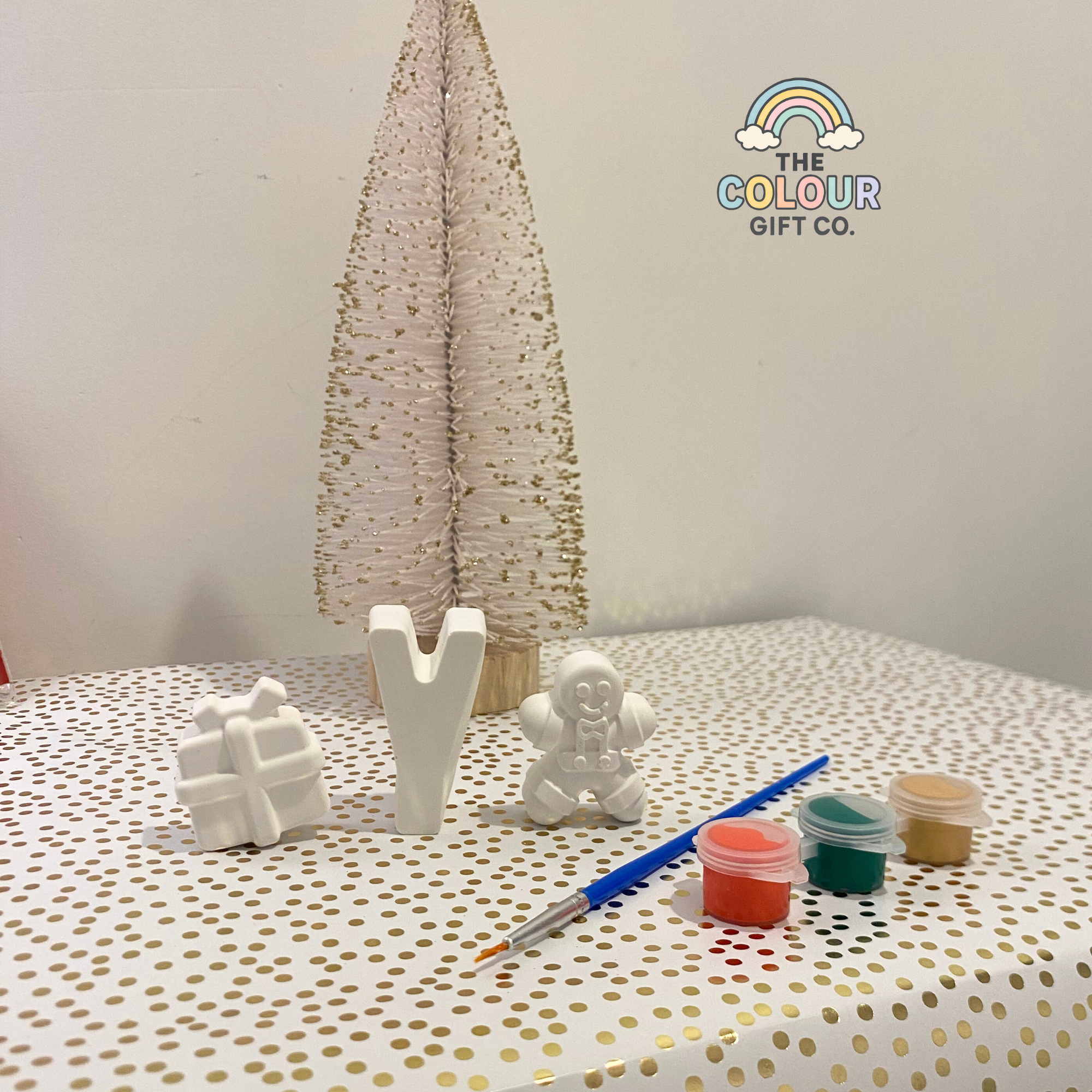 Handmade plaster moulds of gingerbread man and Christmas present ready to paint – festive craft kit