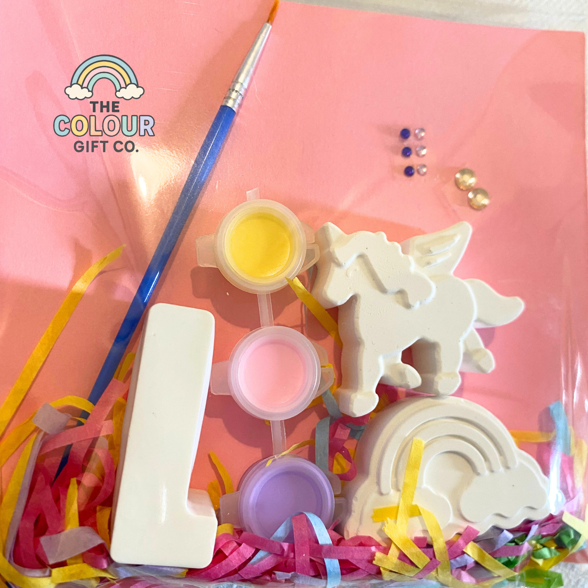 Personalised mini paint kit with initial and themed plaster shapes, stickers, paints, and brush from The Colour Gift Co.
